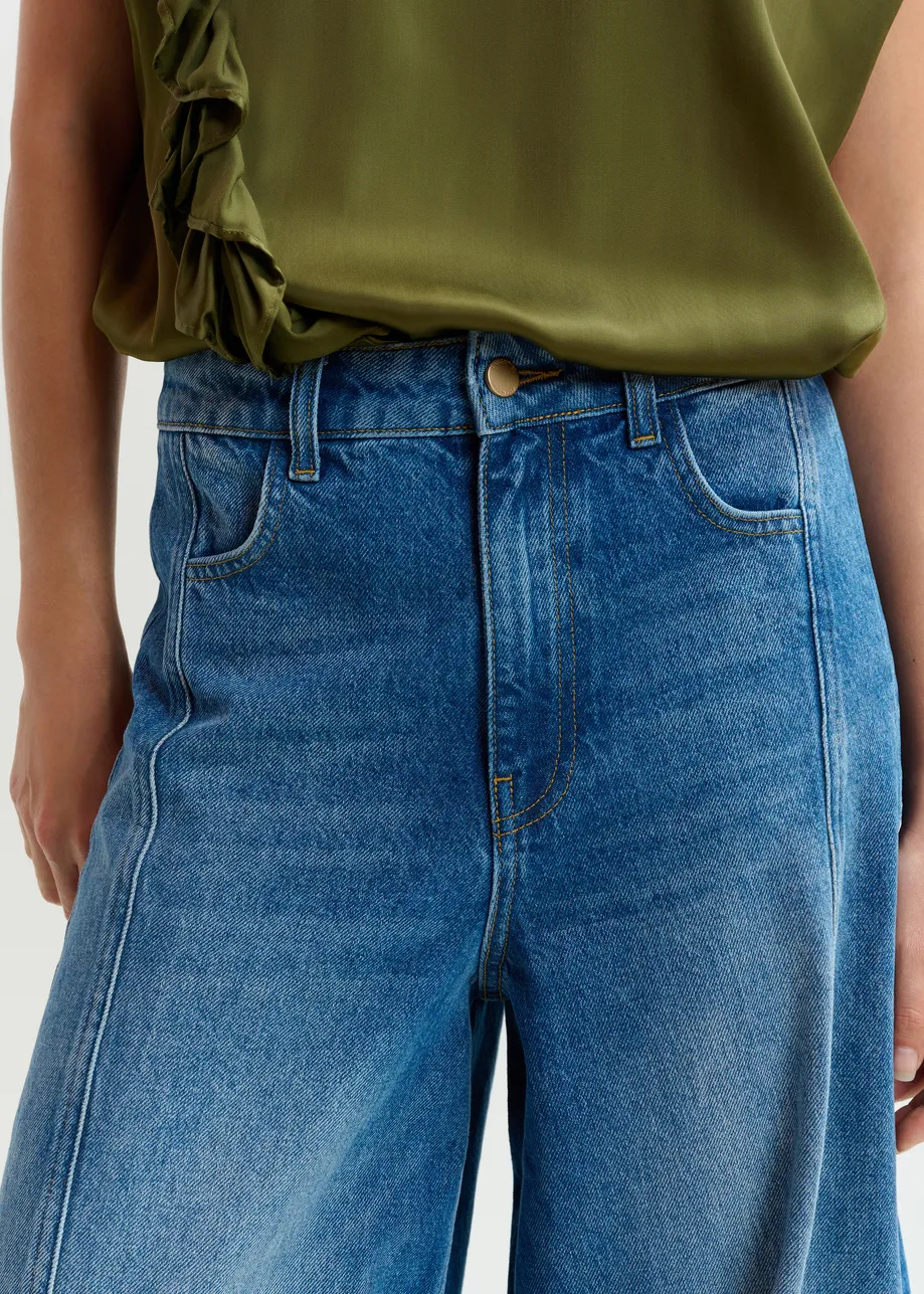 Blauwe katoenen jeans uit twee helften met uitlopende pijp 