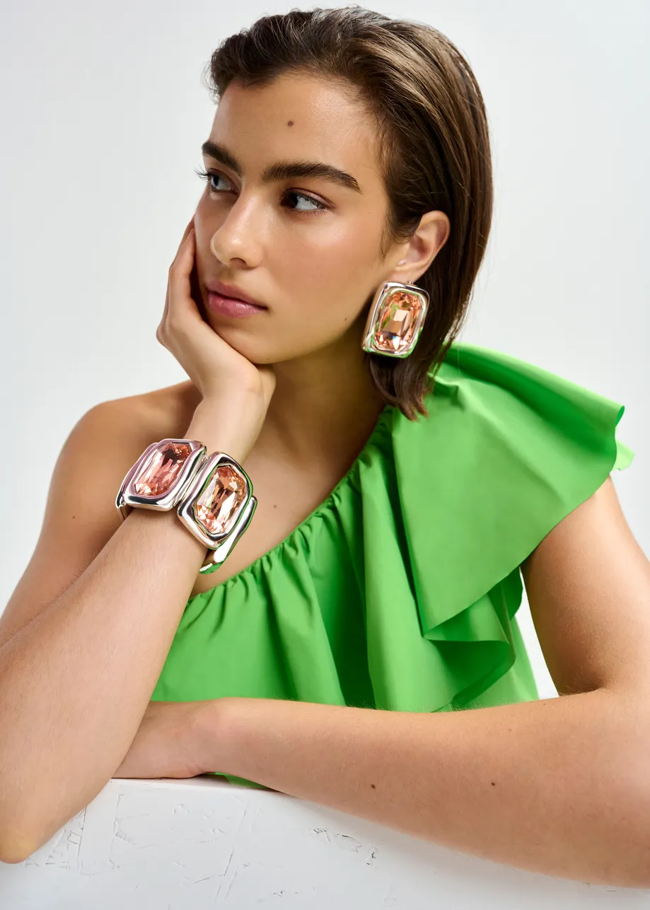 Oranje en zilveren armband met glazen stras