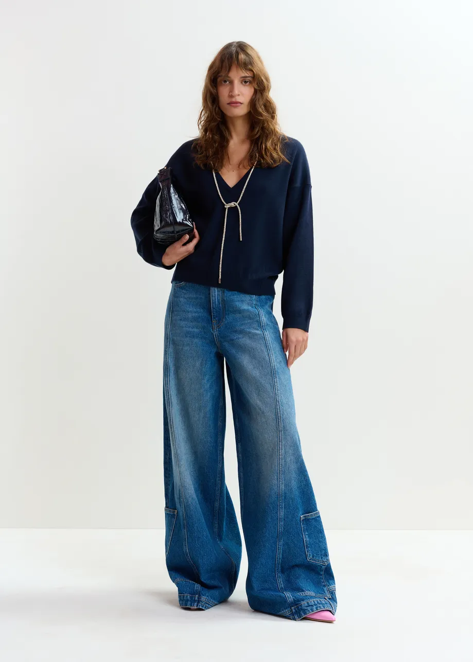 Marineblauwe trui met open rug en siertouw