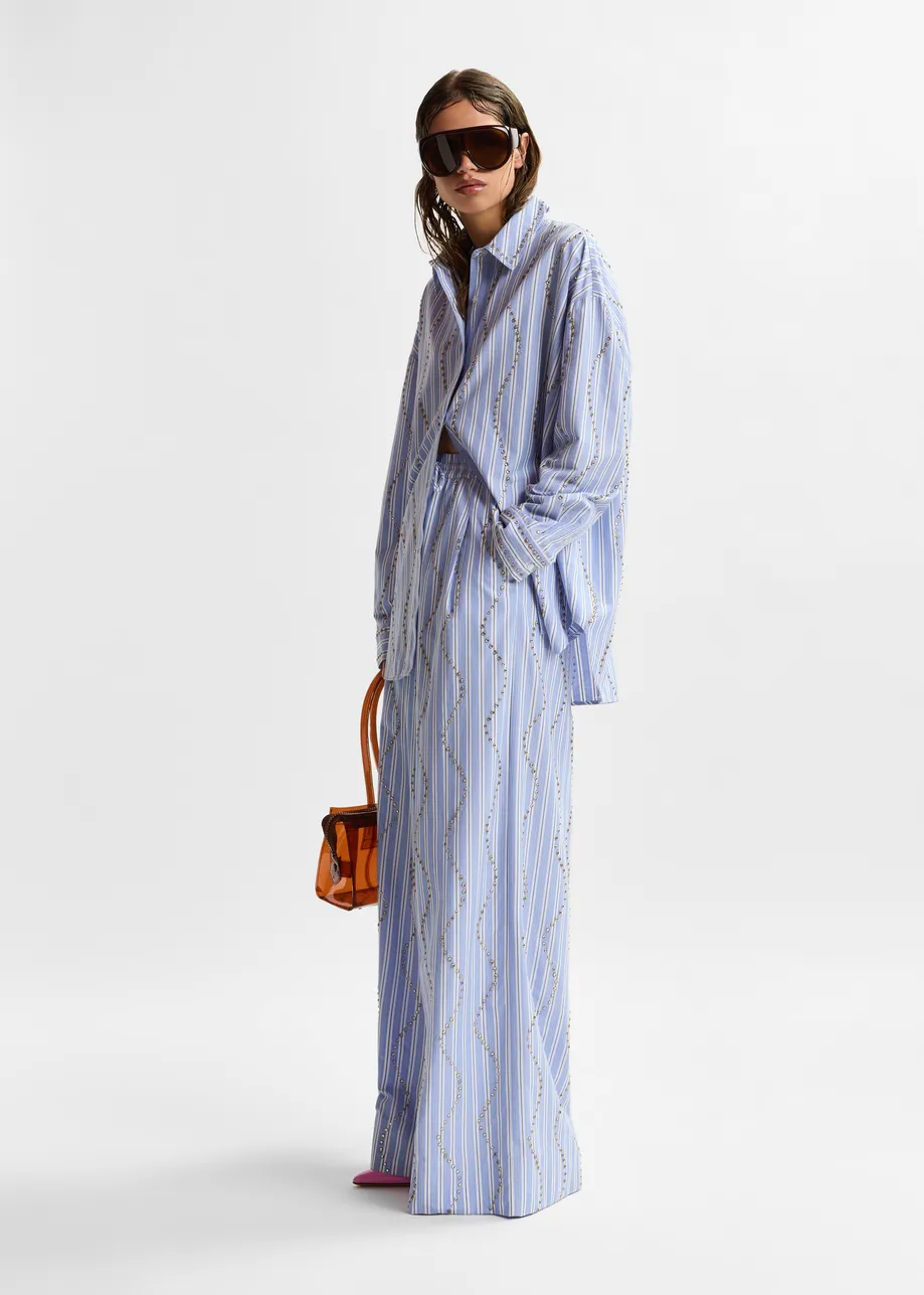 Light blue and white rhinestone-embellished striped wide-leg pants