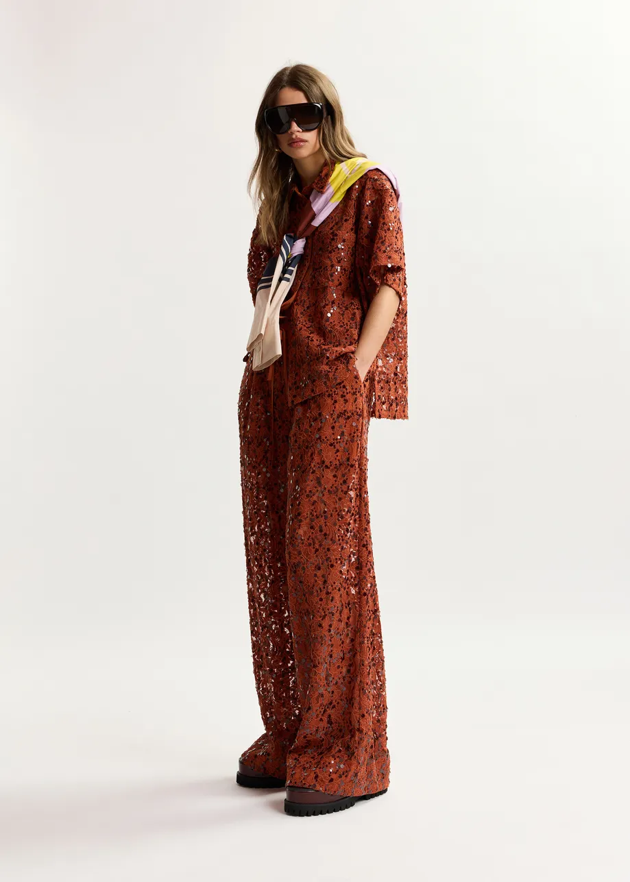 Pantaloni a gamba larga con paillettes color ruggine