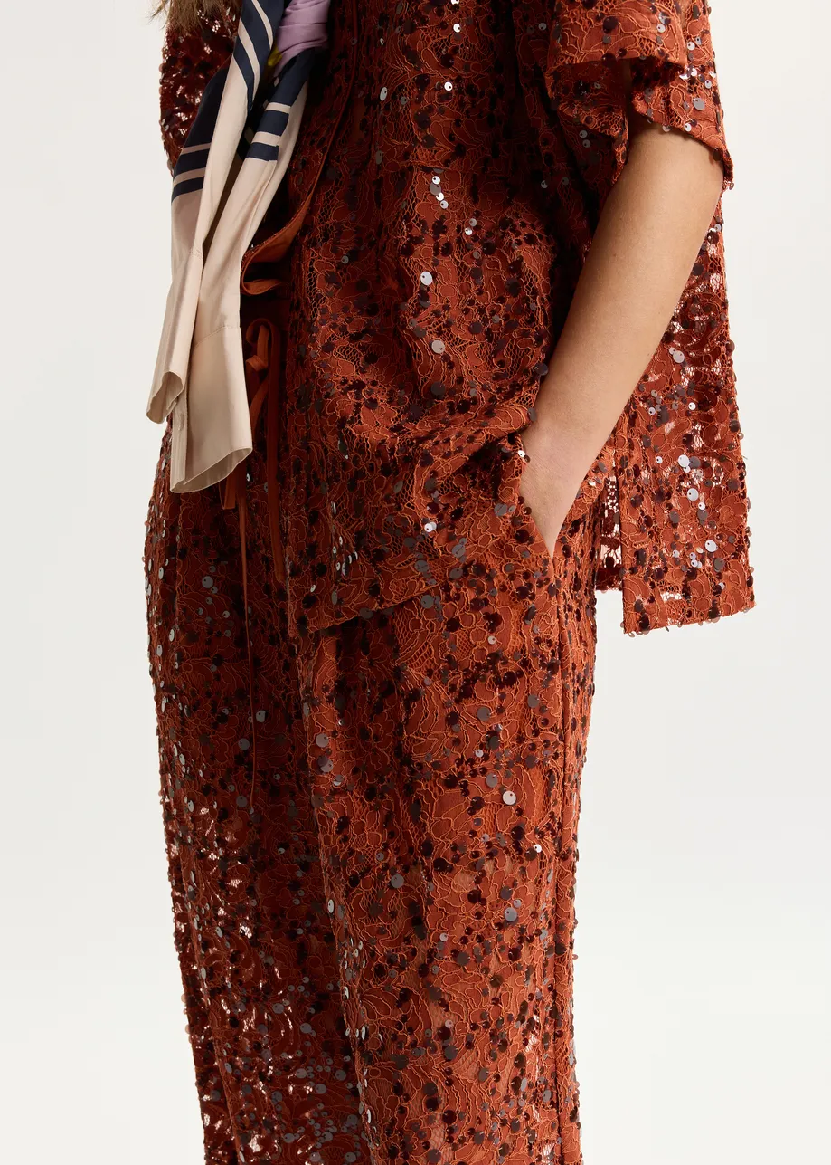 Pantaloni a gamba larga con paillettes color ruggine