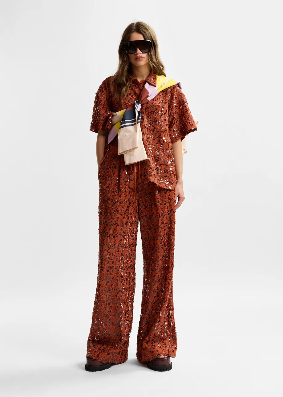 Rust sequin-embellished wide-leg trousers