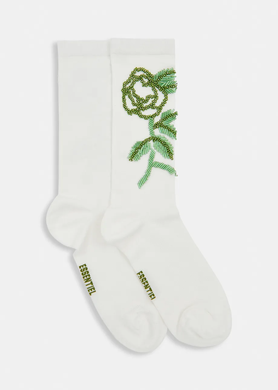 Witte en groene halflange sokken met bloem van kralen