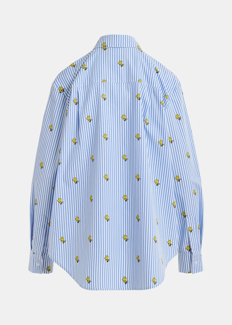 Light blue and white striped oversized cotton shirt with yellow Peanuts™ print