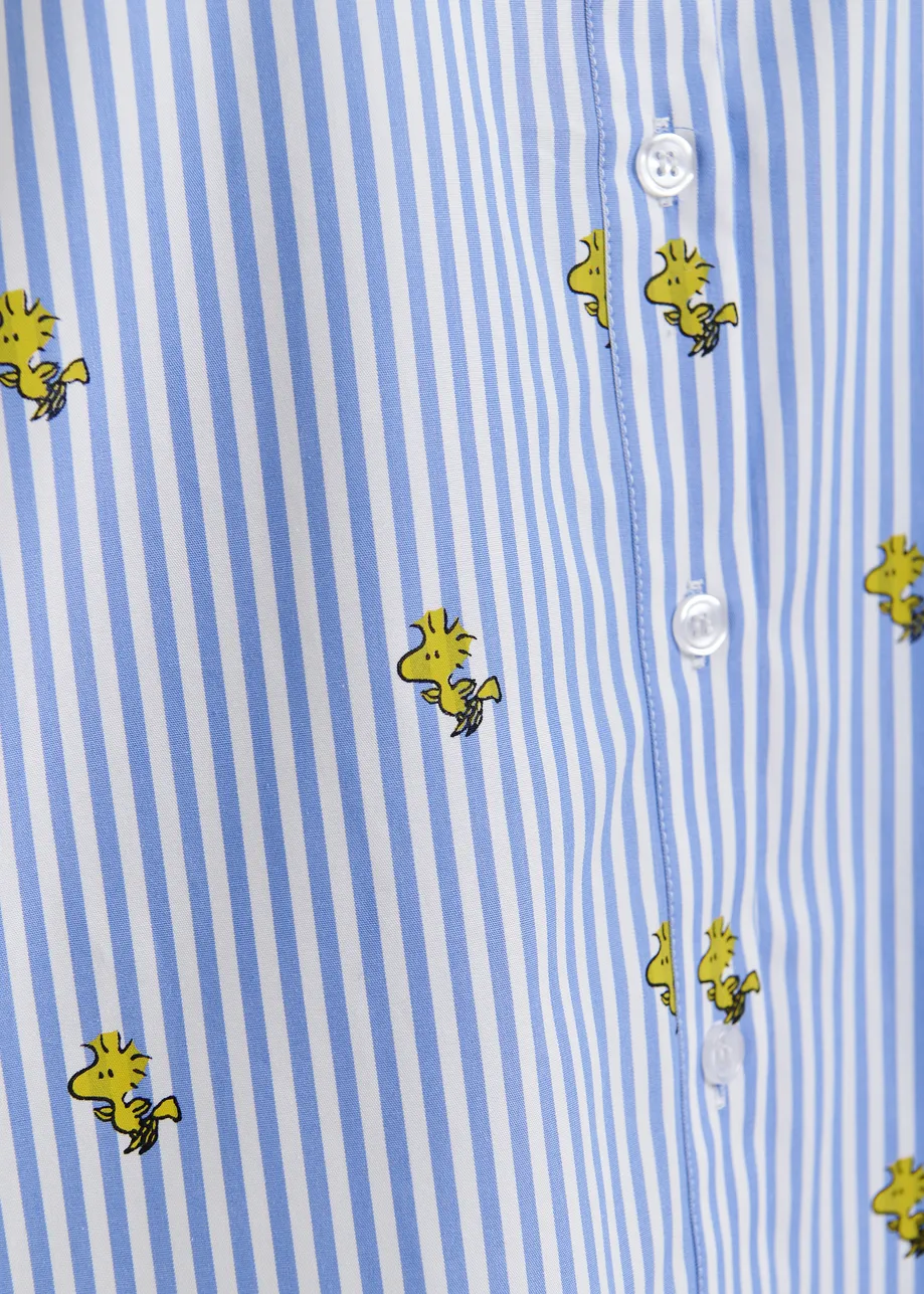 Light blue and white striped oversized cotton shirt with yellow Peanuts™ print