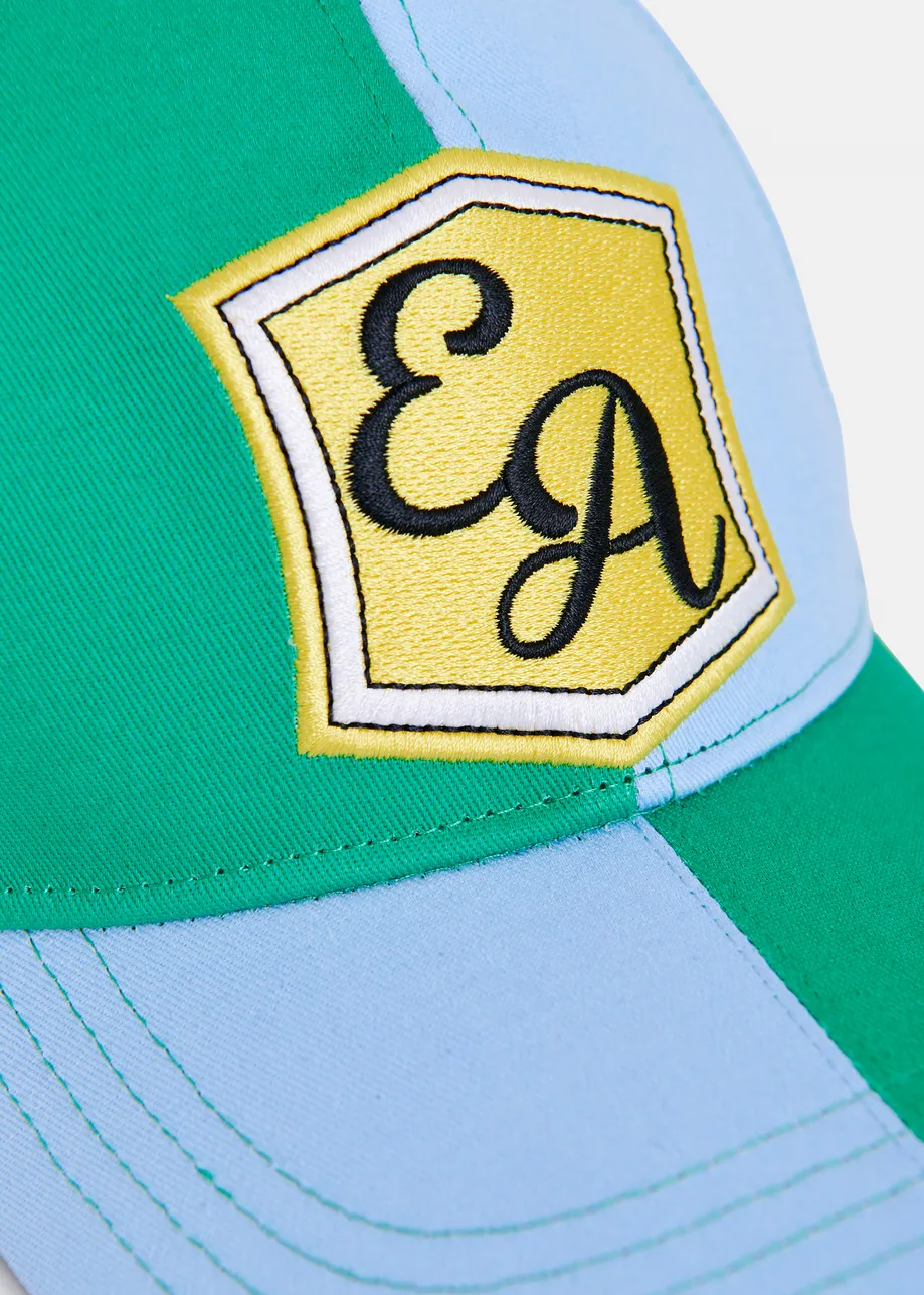 Light blue and green two-tone cotton cap with yellow patch