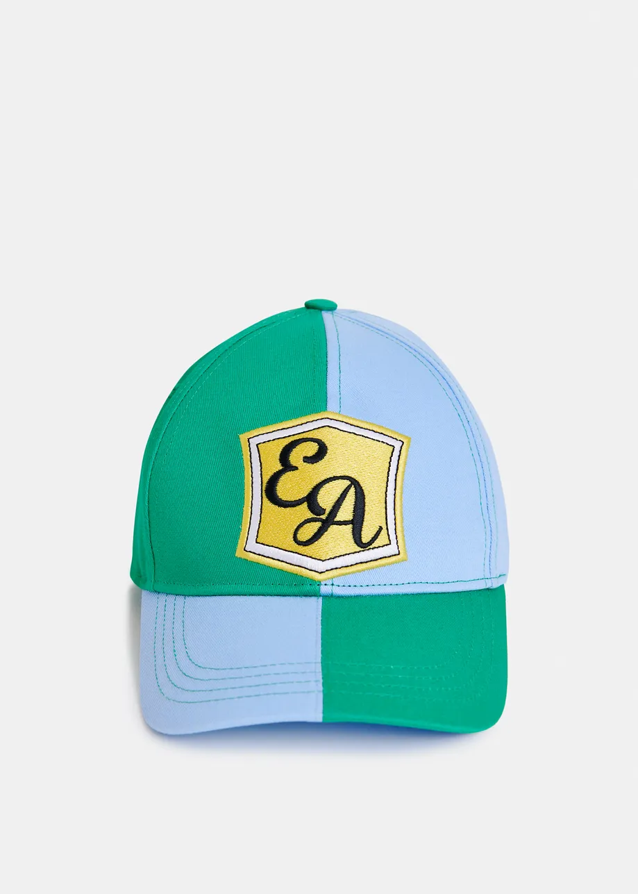 Light blue and green two-tone cotton cap with yellow patch