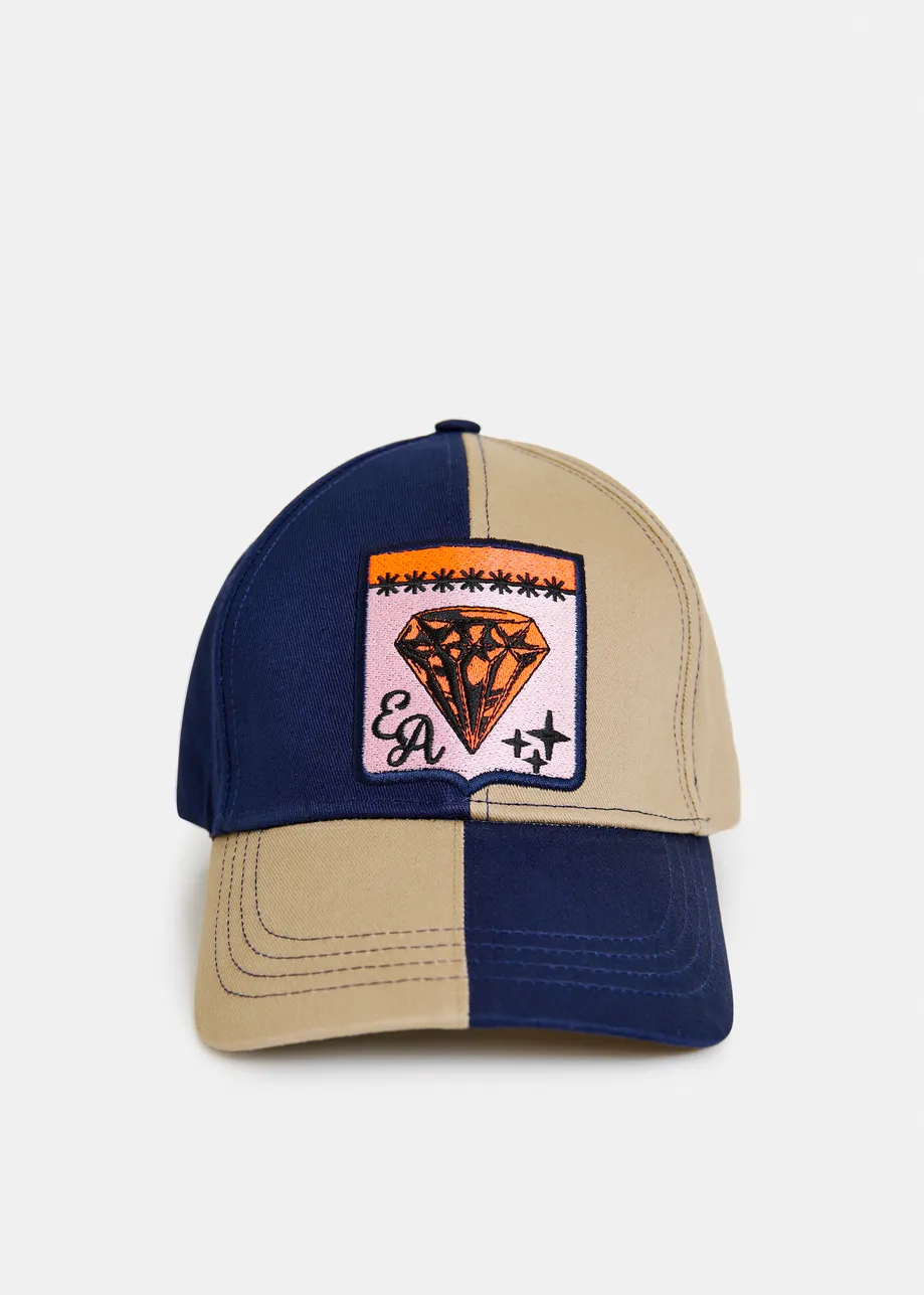 Brown and navy two-tone cotton cap with pink and orange patch