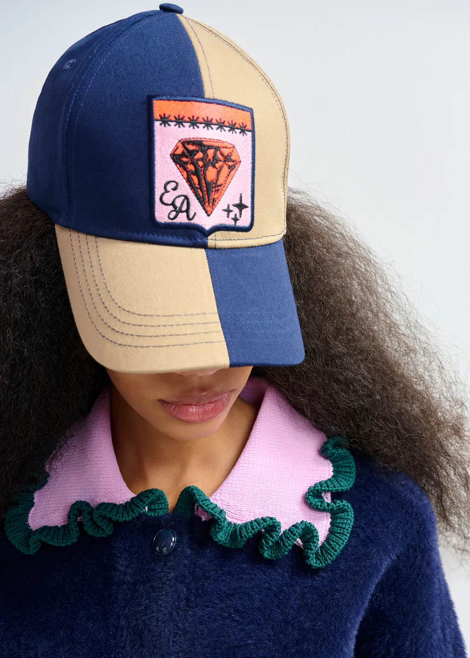 Brown and navy two-tone cotton cap with pink and orange patch