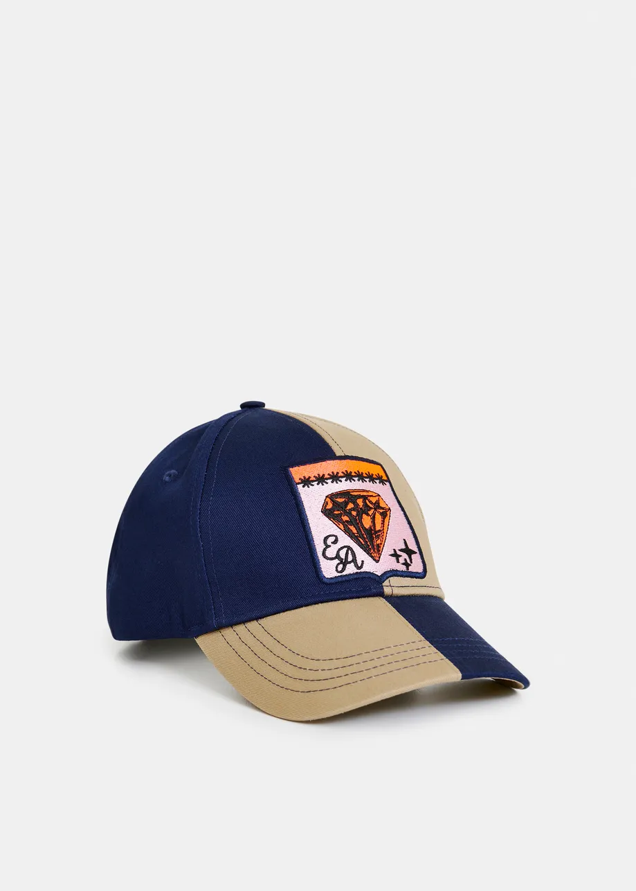 Brown and navy two-tone cotton cap with pink and orange patch