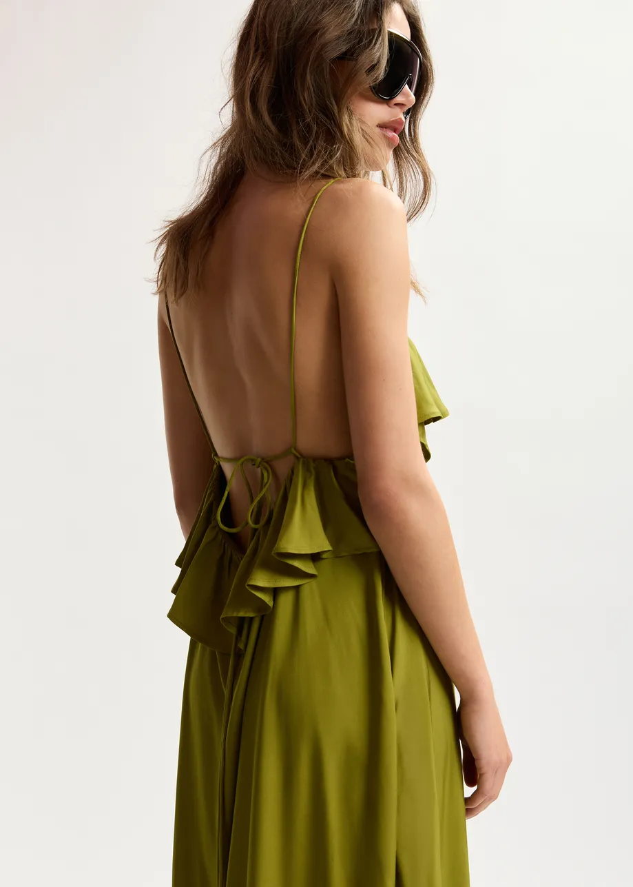 Green maxi dress with ruffled neckline and tie-back detail