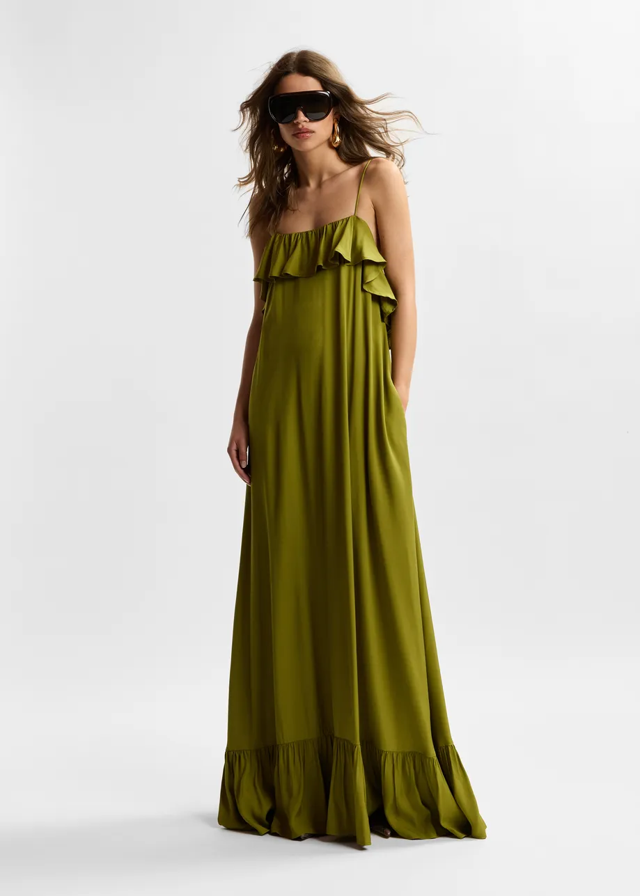 Green maxi dress with ruffled neckline and tie-back detail