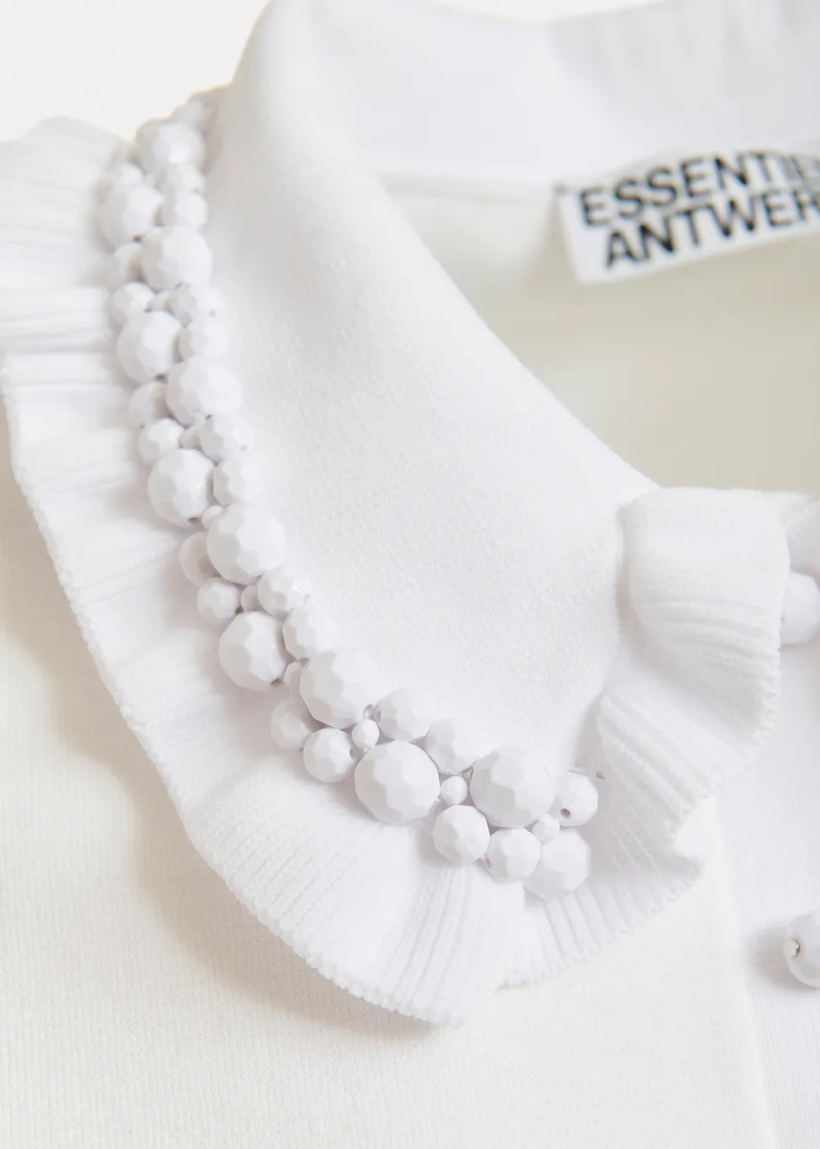 Witte fijngebreide polo met versierde kraag