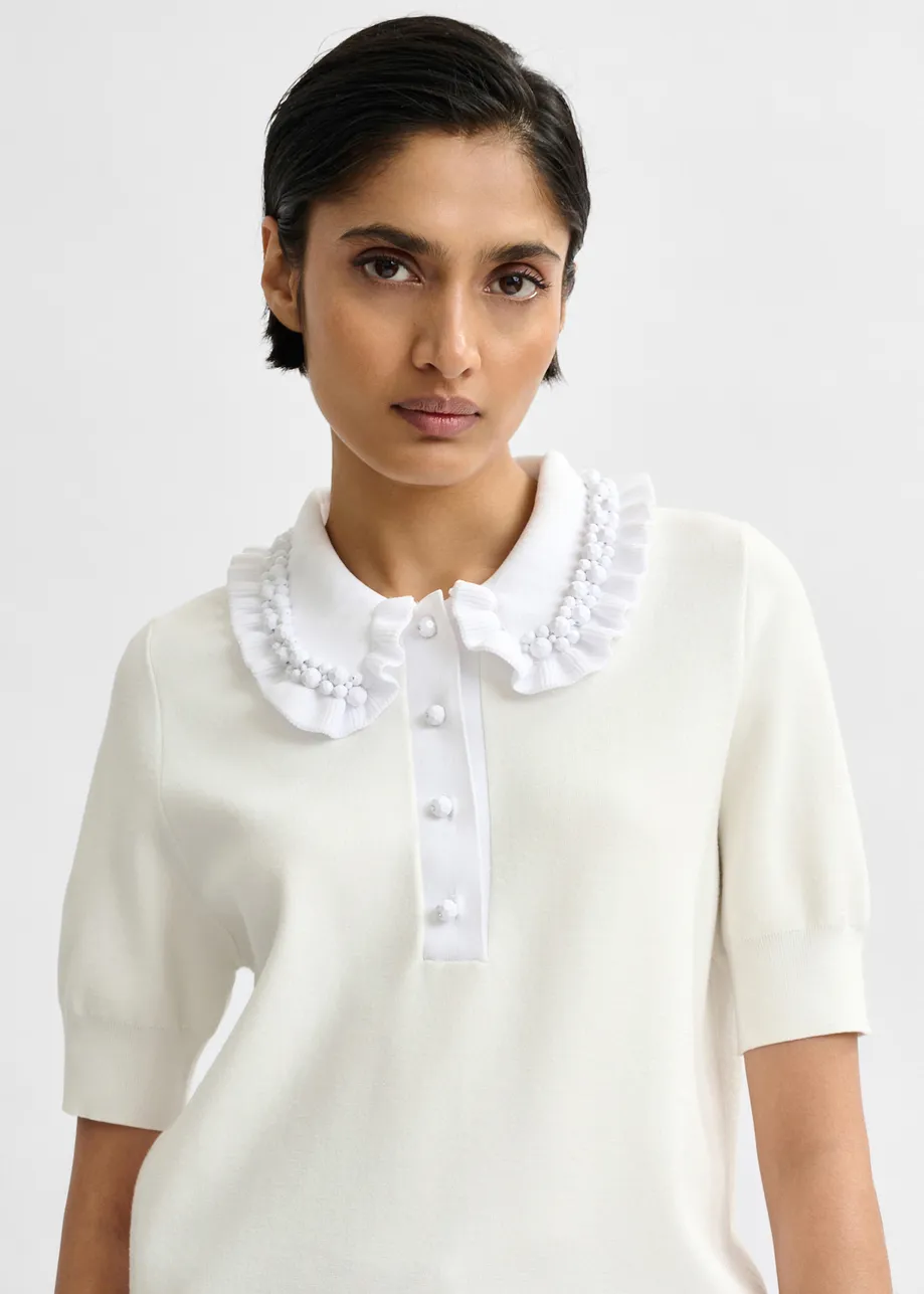White ruffle fine-knit polo top with bead embellishments