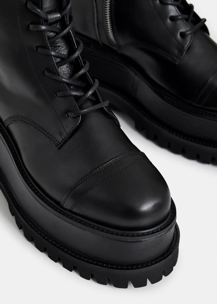 Black platform leather lace-up combat boots