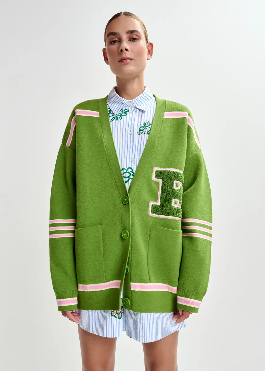 Groene cardigan met roze strepen en appliqué