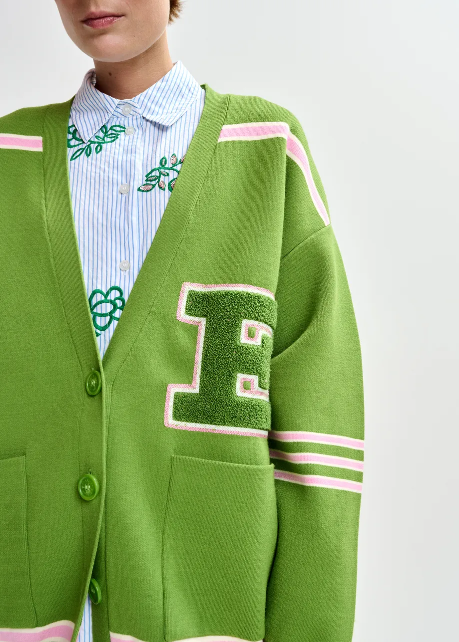 Groene cardigan met roze strepen en appliqué