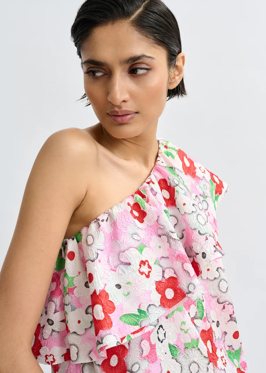 Gebroken witte en veelkleurige asymmetrische éénschoudertop met volants