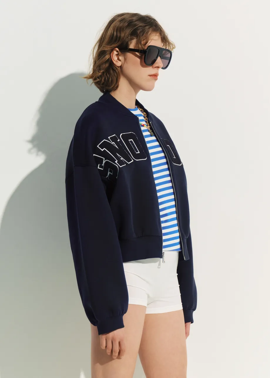 Navy bomber with Snoopy letter appliqués