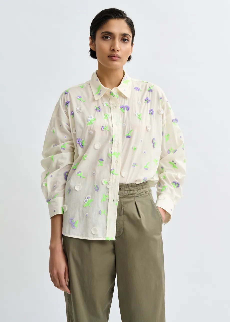 Off-white cotton shirt with purple and green flower sequin, rhinestone and bead embellishments