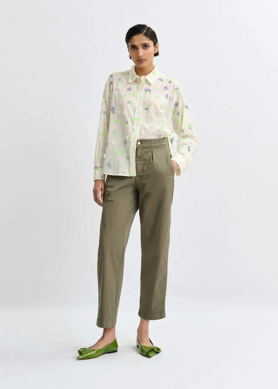 Off-white cotton shirt with purple and green flower sequin, rhinestone and bead embellishments