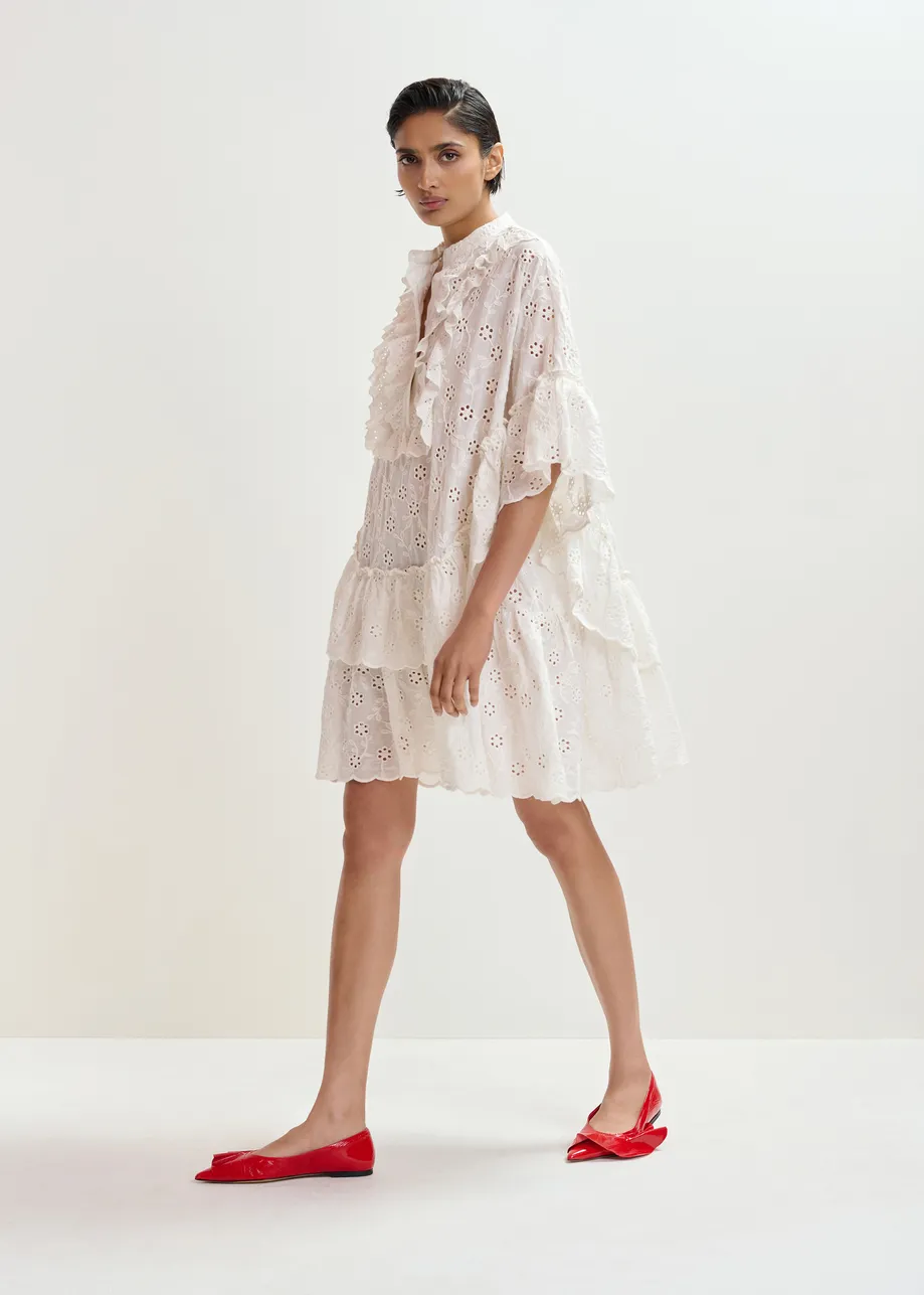 White broderie anglaise cotton mini dress with ruffled trims