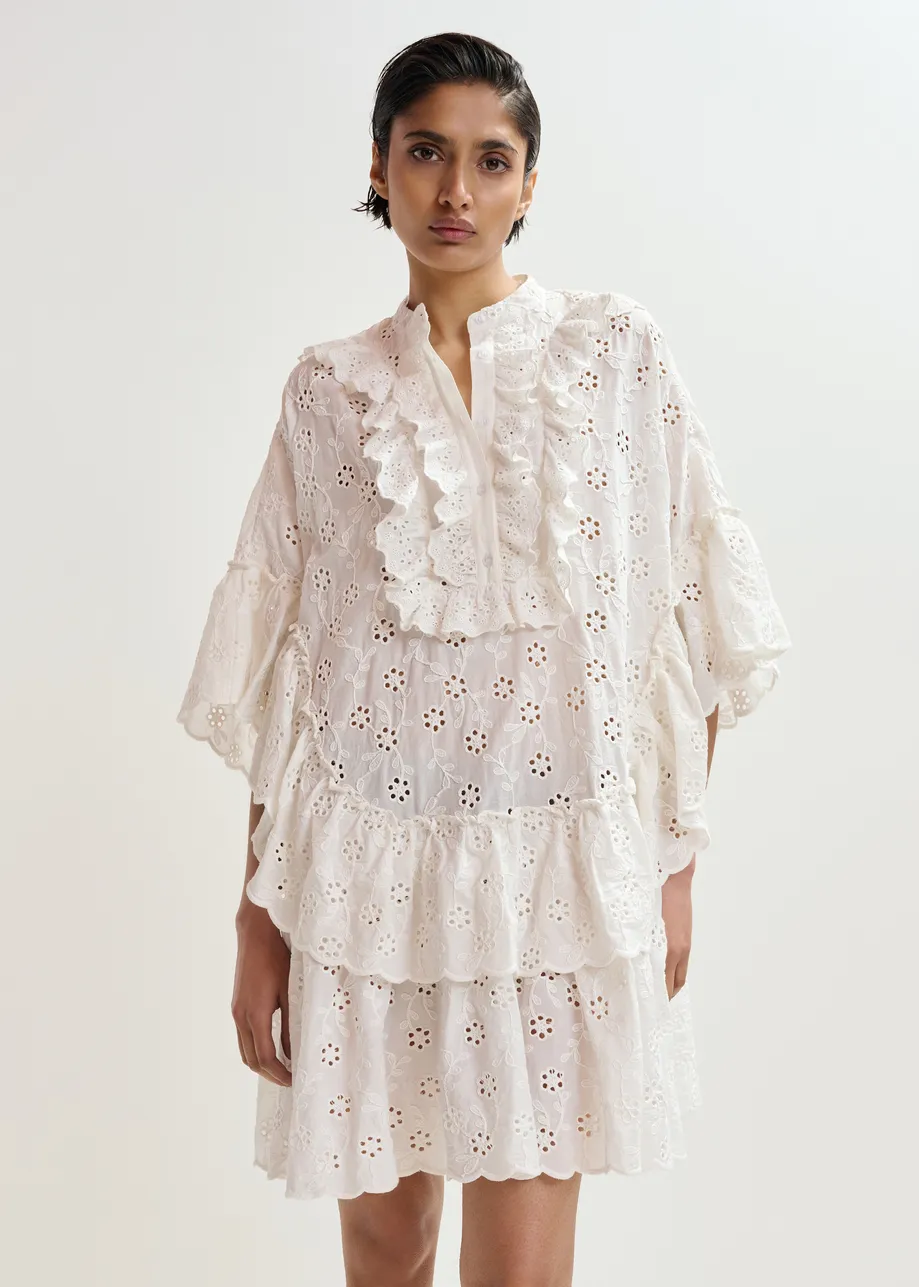 White broderie anglaise cotton mini dress with ruffled trims