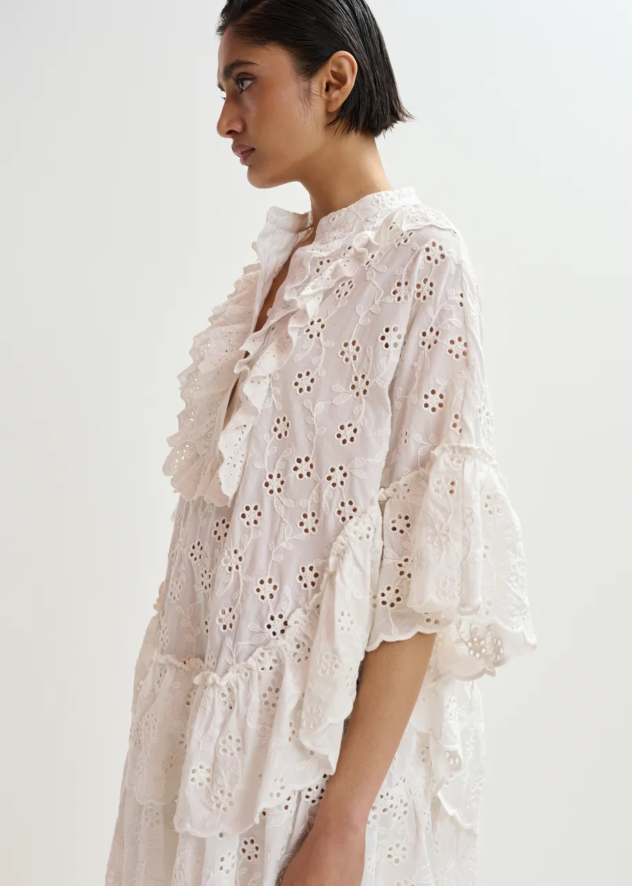 White broderie anglaise cotton mini dress with ruffled trims