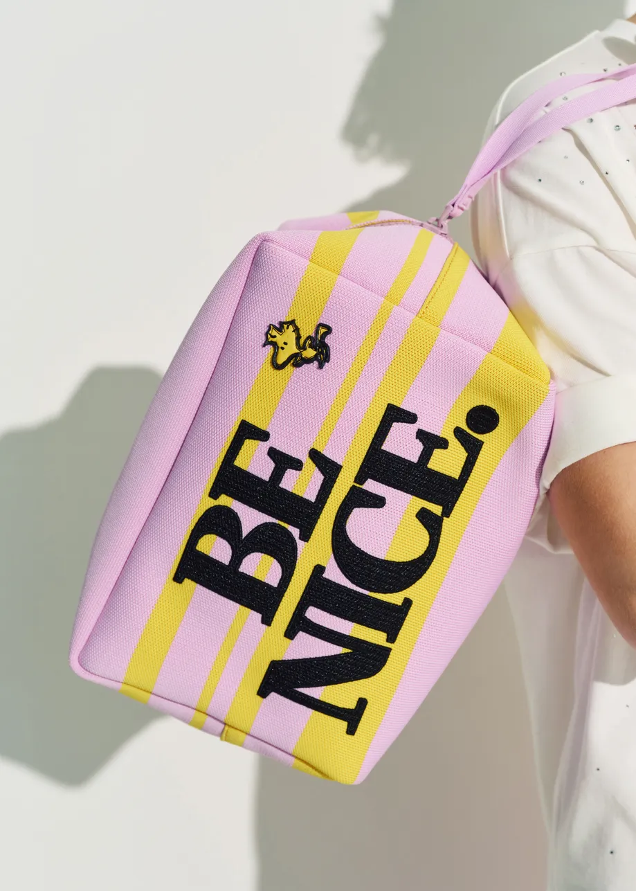 Lilac and yellow striped pouch with Peanuts™ Snoopy motif and black text embroidery