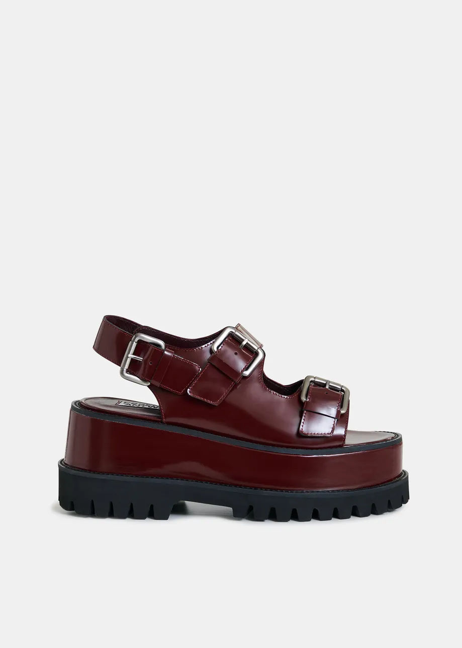 Brown chunky leather platform sandals with buckle details