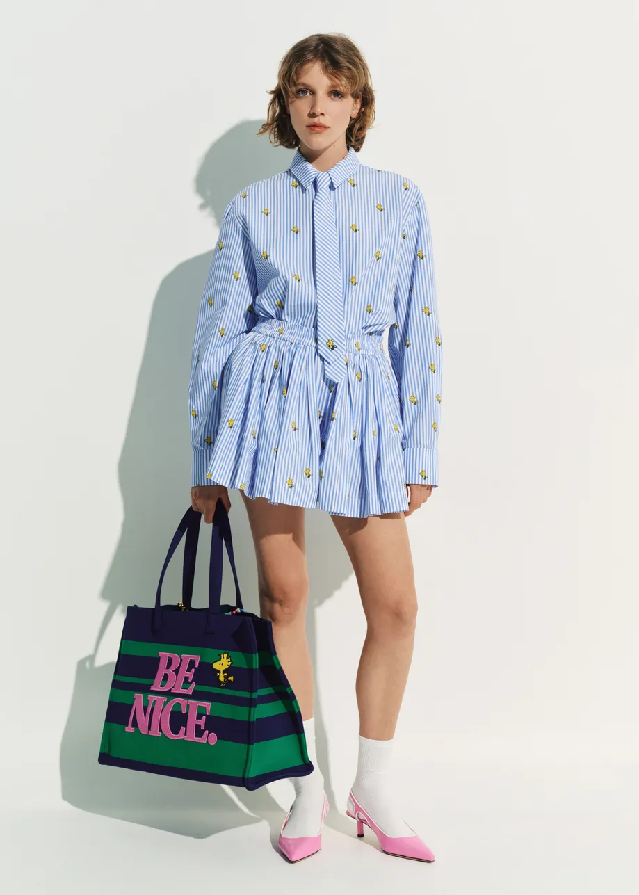 Light blue and white striped cotton shorts with yellow Peanuts™ print