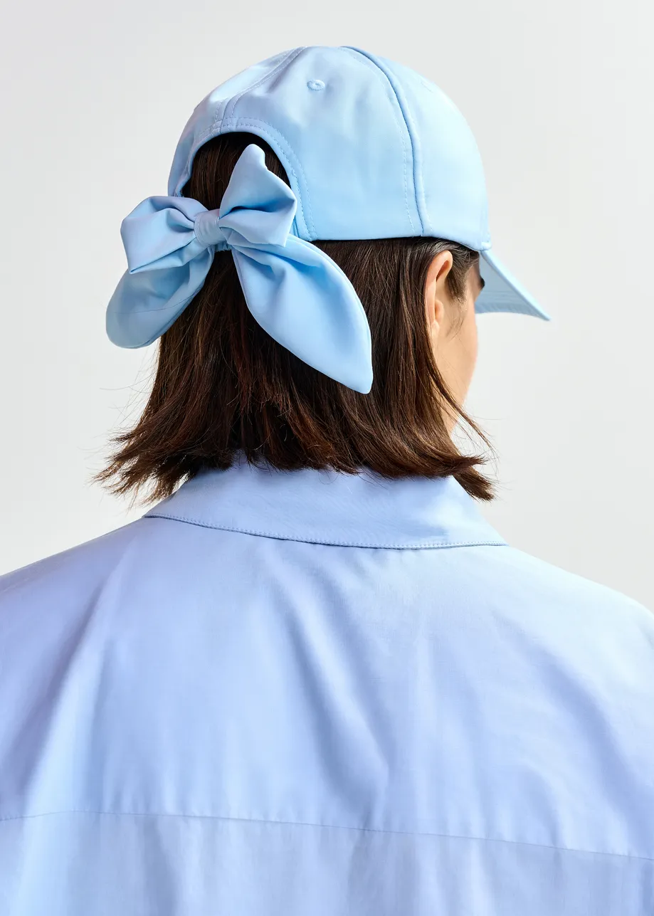 Casquette de baseball bleu clair avec E et nœud