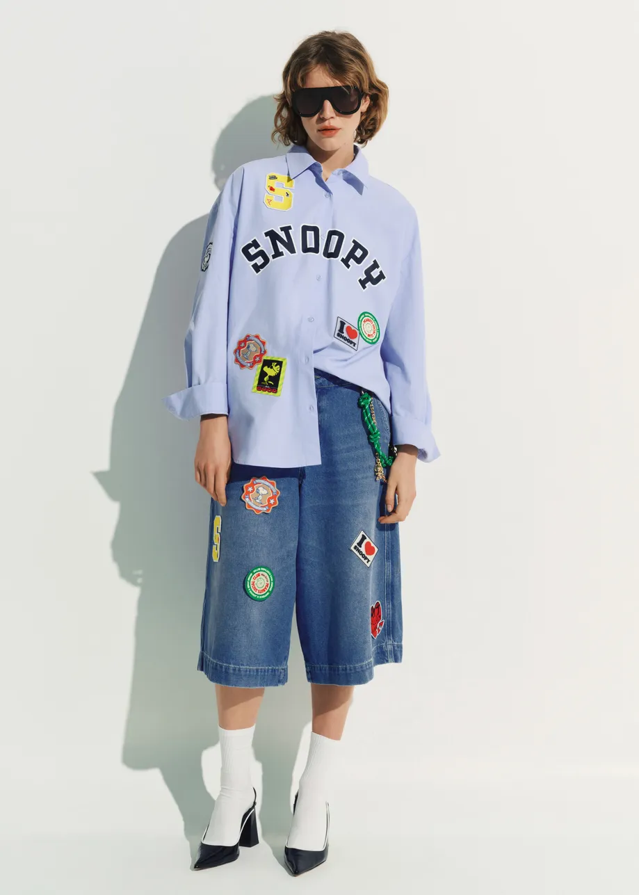 Blue cotton denim shorts with yellow Woodstock embroidery 