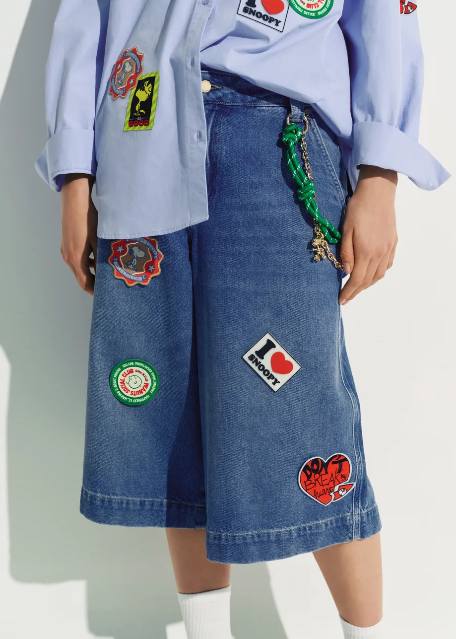 Blue cotton denim shorts with yellow Woodstock embroidery 