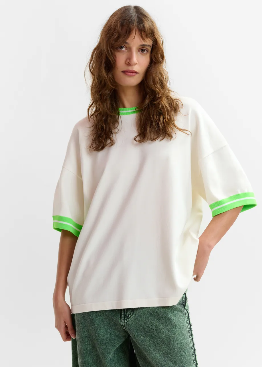 Off-white knit T-shirt with light green contrasting trim