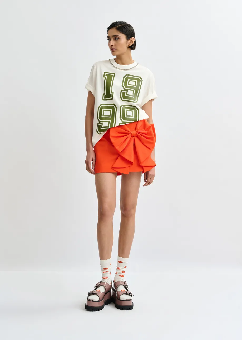 T-shirt en coton blanc cassé à imprimé numérique vert et encolure en strass