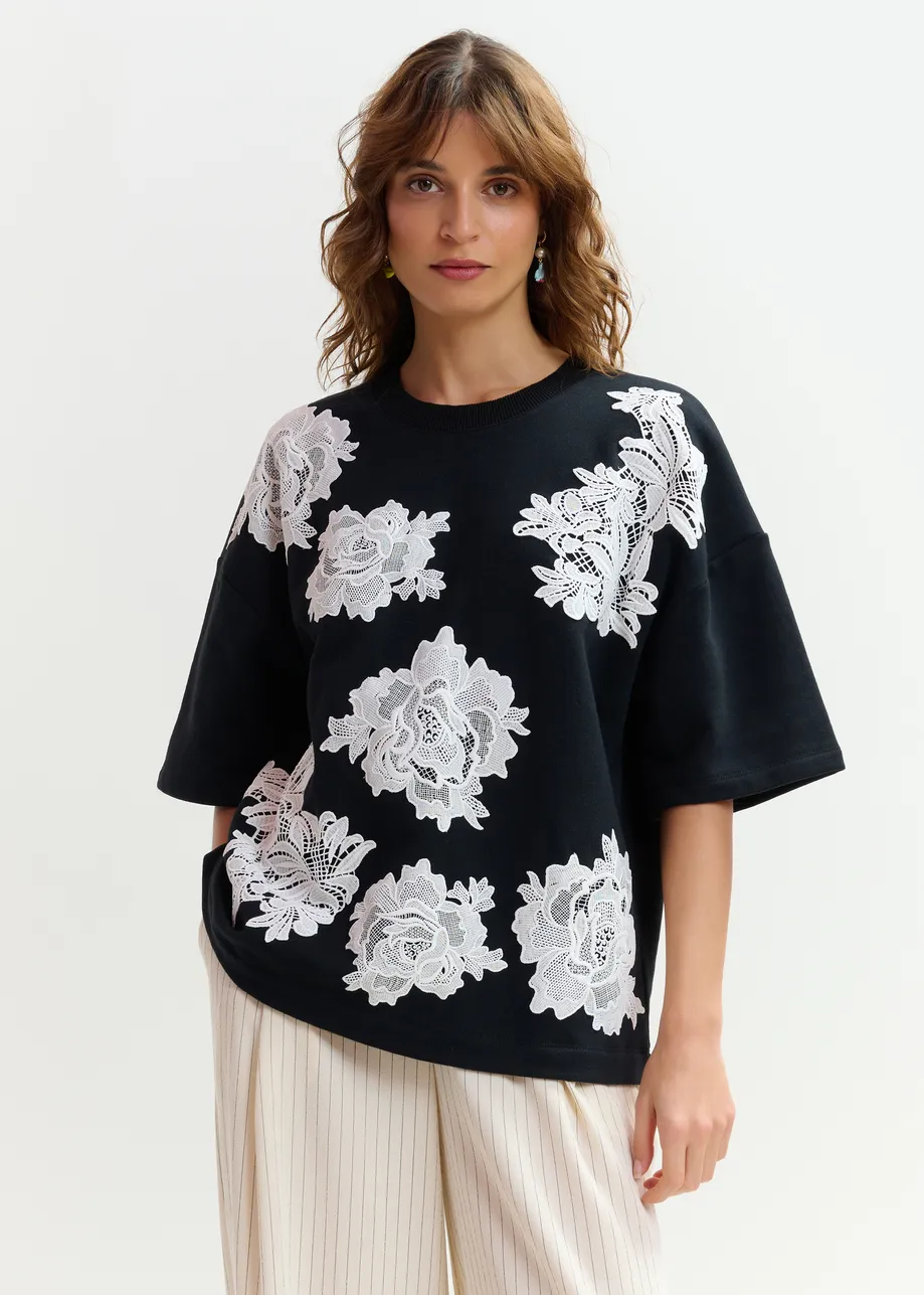 Black and white floral lace-embellished sweatshirt