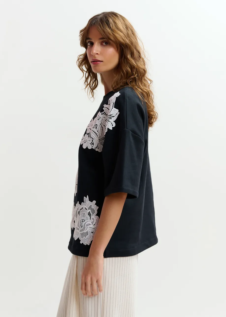 Black and white floral lace-embellished sweatshirt