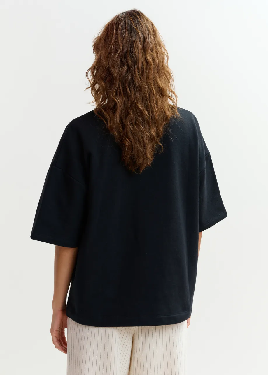 Black and white floral lace-embellished sweatshirt