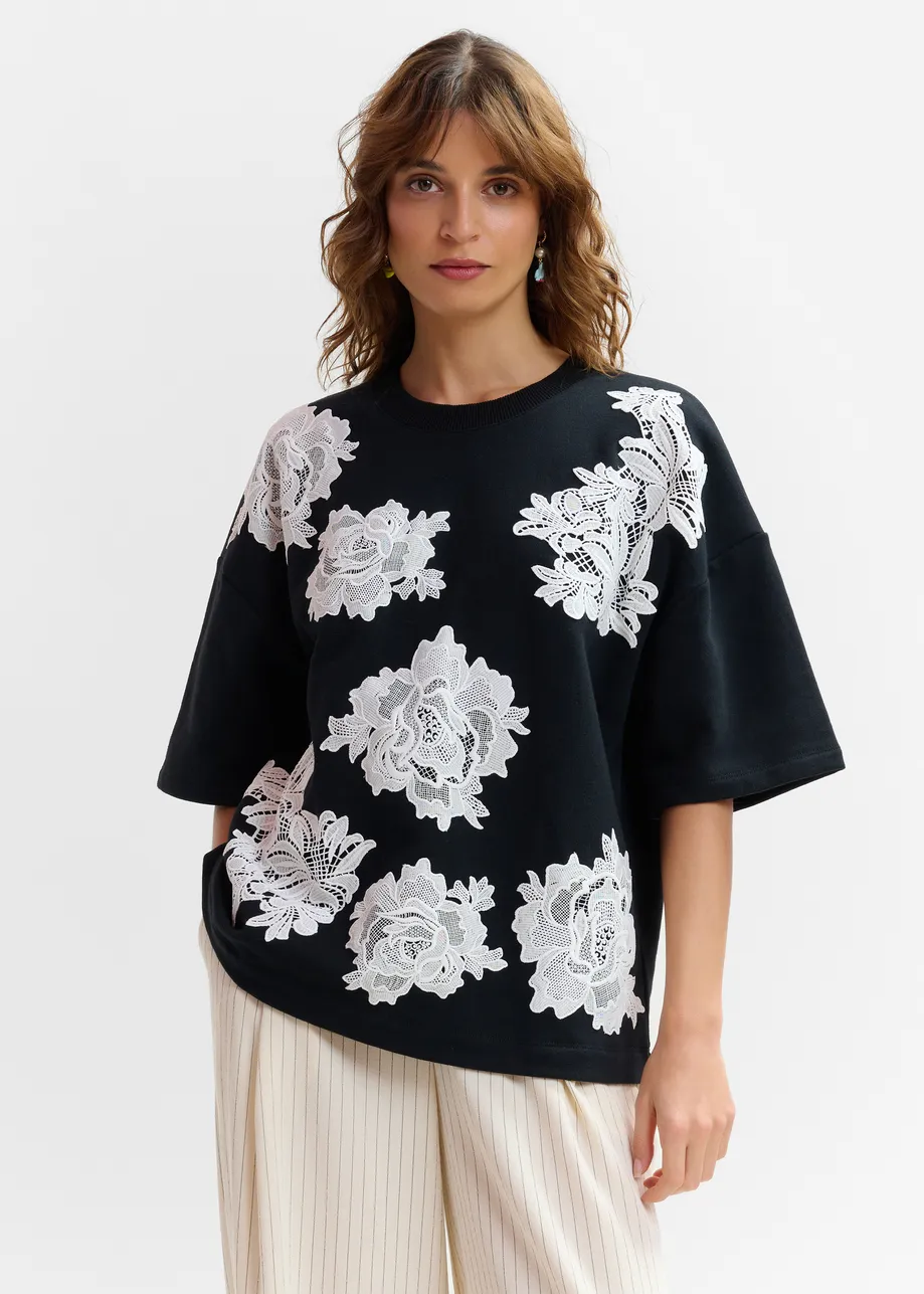 Black and white floral lace-embellished sweatshirt