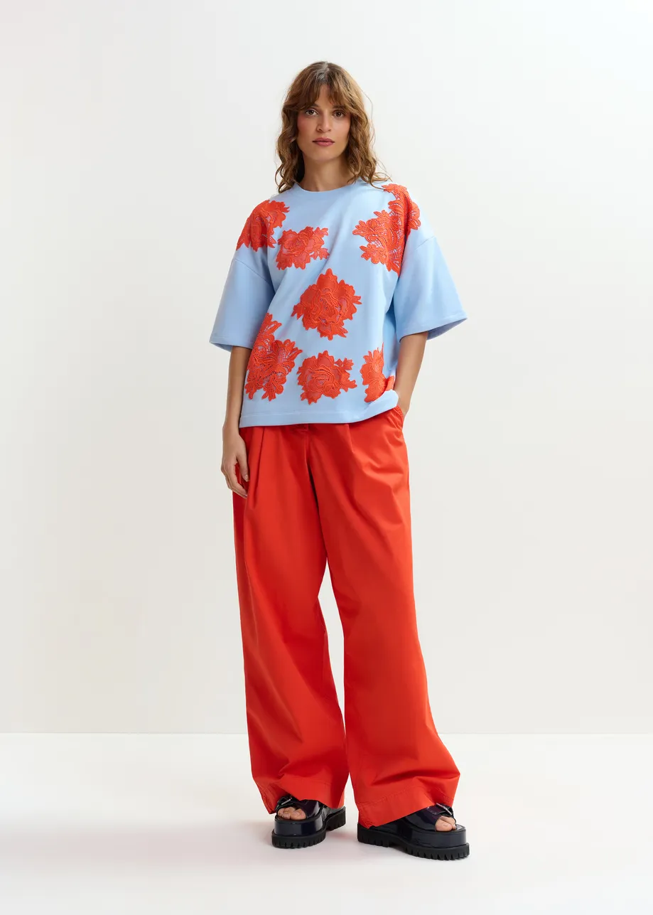Light blue and orange floral lace-embellished sweatshirt