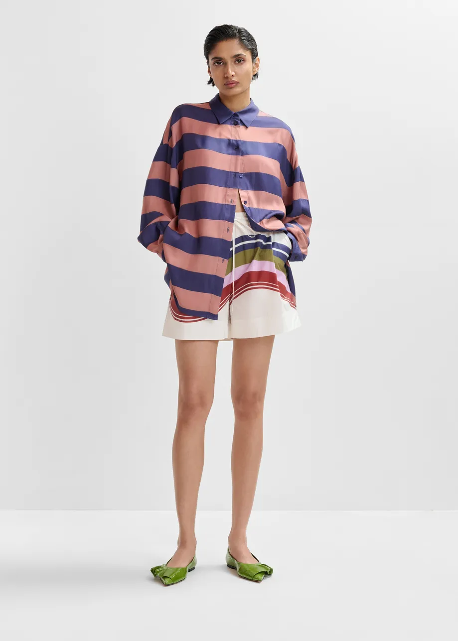 Off-white and multicolor cotton shorts with placed stripe print