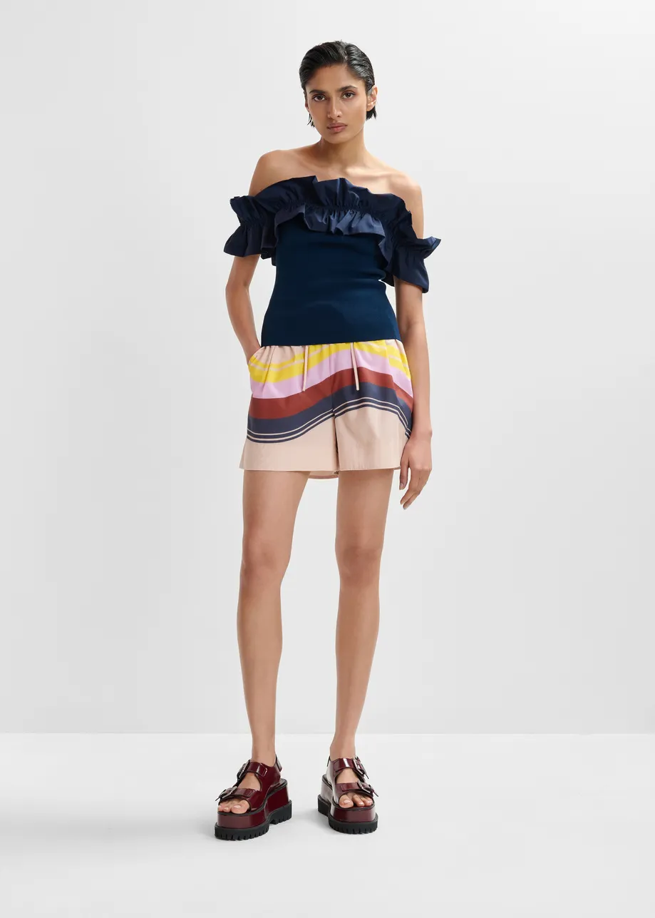 Cream and multicolor cotton shorts with placed stripe print