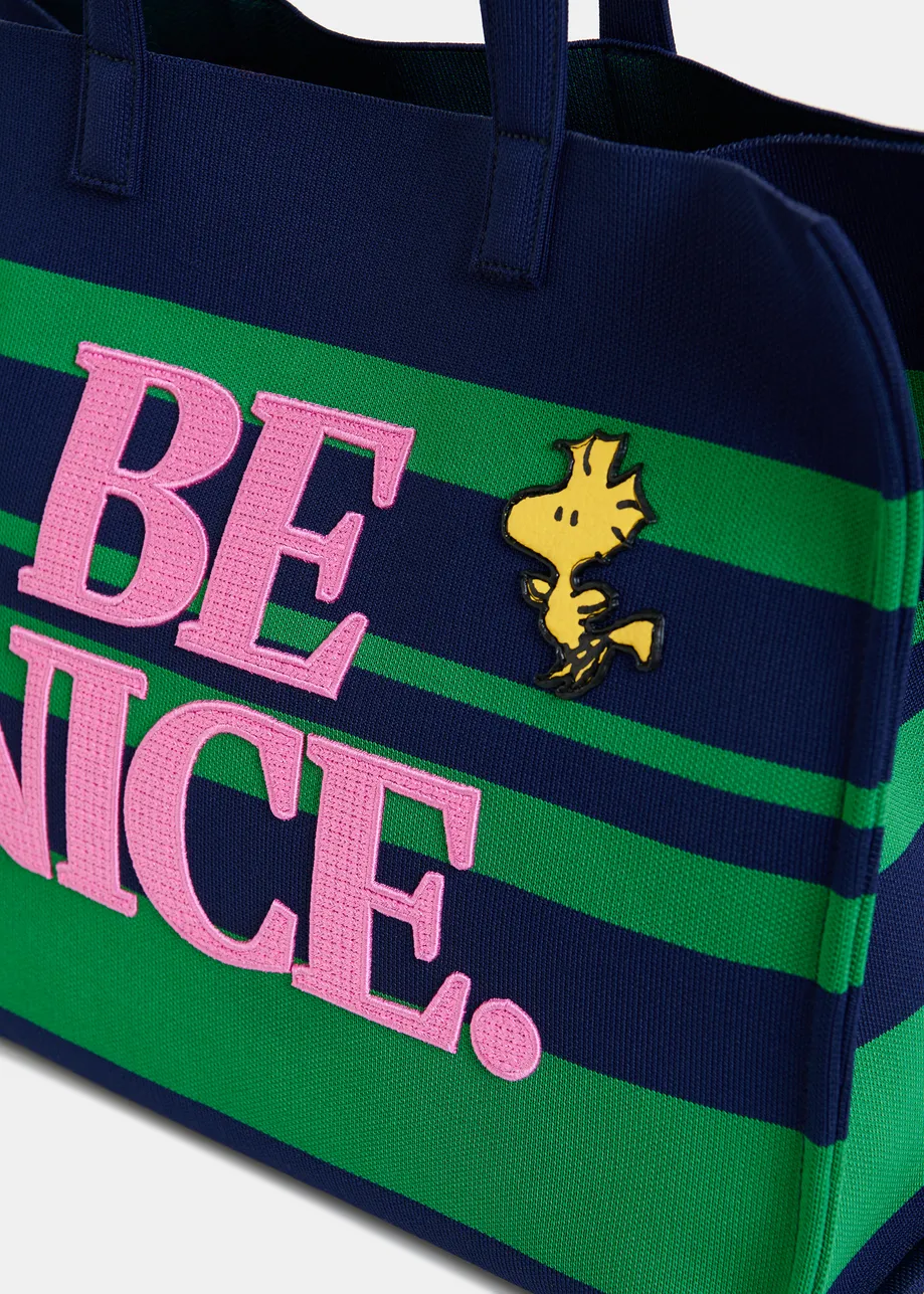 Navy and green striped shopper bag with Peanuts™ Snoopy graphics and lilac text print