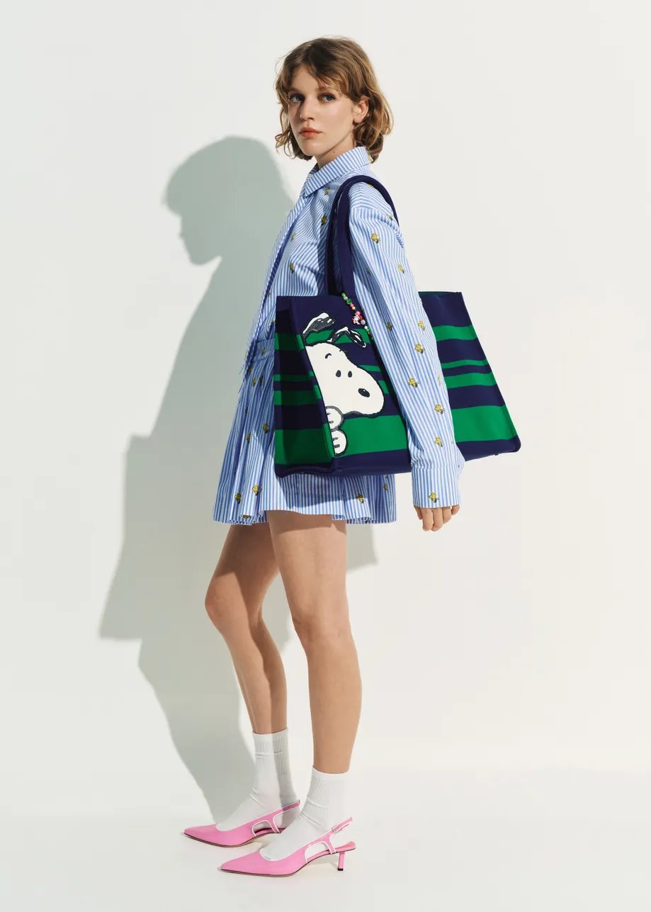 Navy and green striped shopper bag with Peanuts™ Snoopy graphics and lilac text print