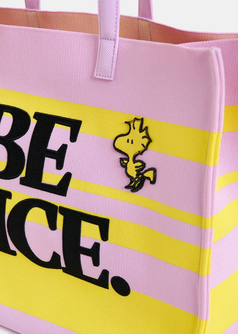 Lilac and yellow striped shopper bag with Peanuts™ Snoopy graphics and black text print
