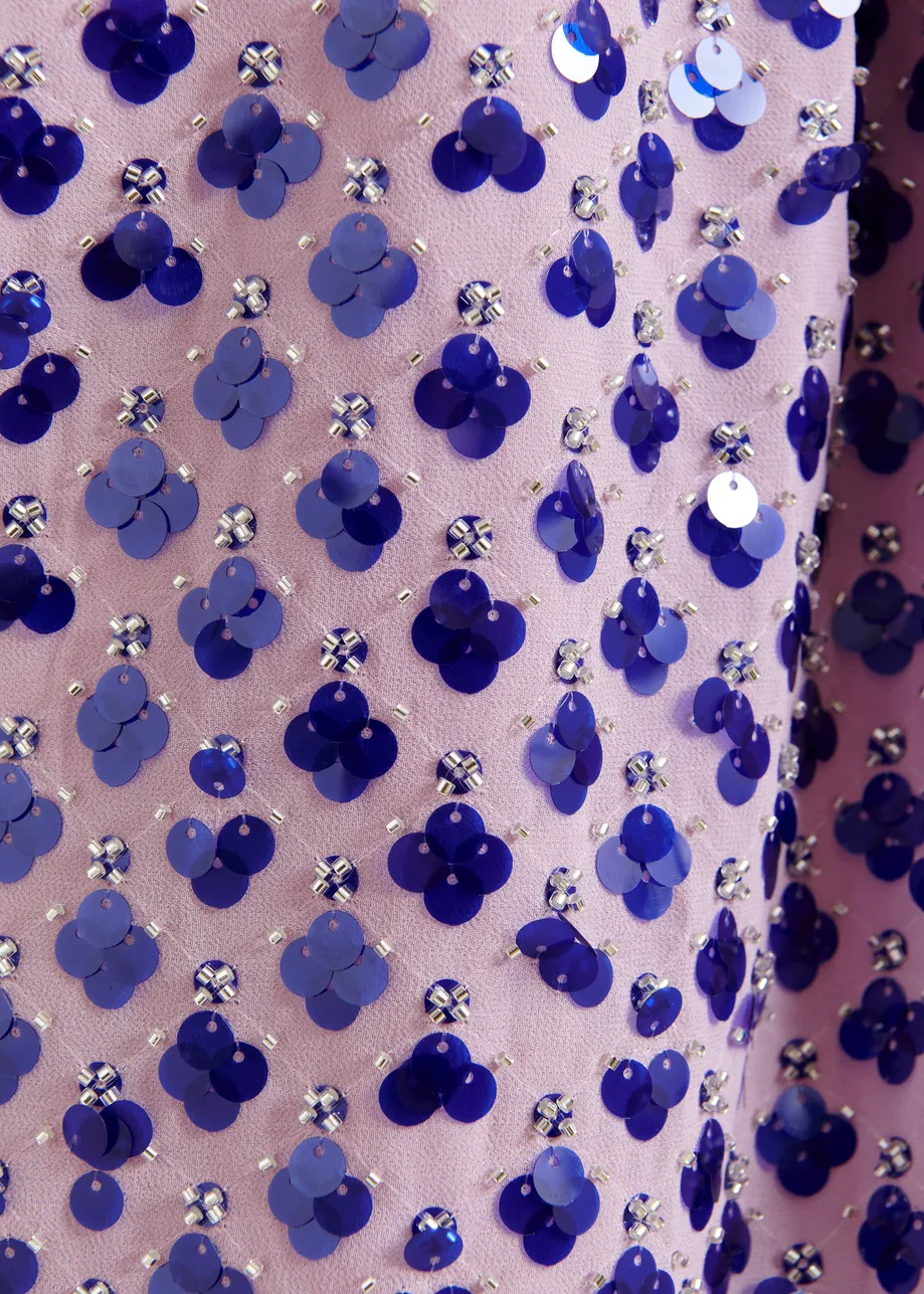 Paarse asymmetrische top met pailletten en strik