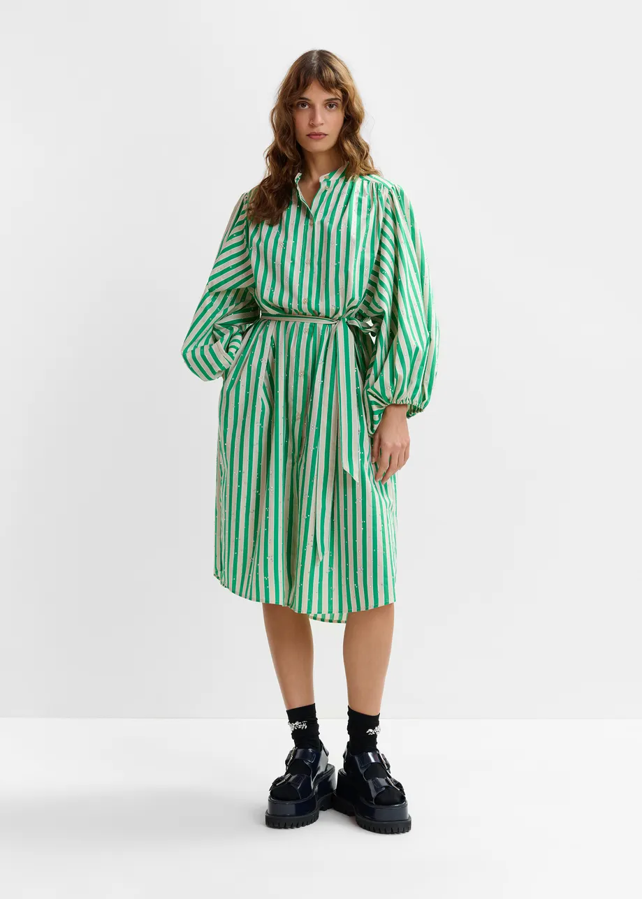 Green and cream striped maxi-length dress with mandarin collar and rhinestone embellishments