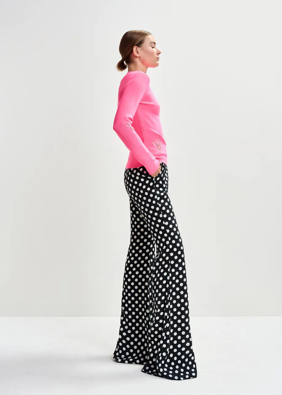 Zwart-witte broek met stippenprint 